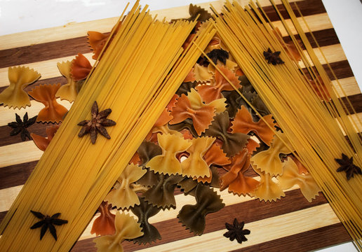 Pasta products on wooden table.