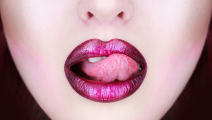Tongue and sexy mouth. Woman lip, female lips. Beautiful lip, lipstick and lipgloss, passionate. Sexy lips, tongue out. Beautiful sexy woman, nude girl. Close up, macro with beautiful mouth.