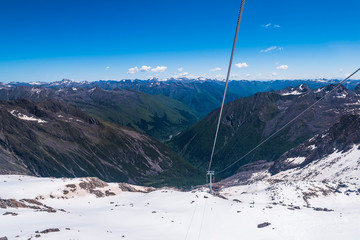 cable car on the snow mountains in winter background