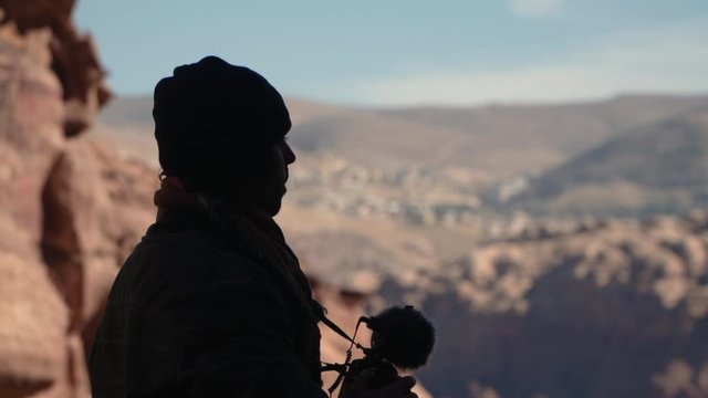 photographer taking a picture in petra landscape