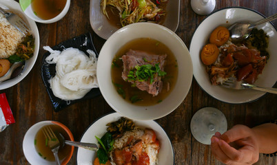 Thai street food on wood texture.
