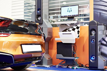 Contactless stand for checking wheel alignment