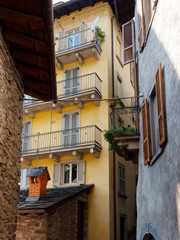 old wooden door on the wall of an italian house