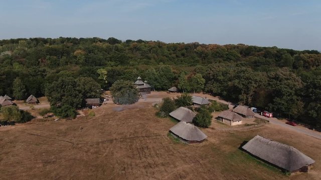 aerial view traditional village  with wooden houses  open air museum of flork architecture  pirogovo Ukraine Kiev HD video