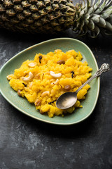 Pineapple sheera or Halwa also known as Ananas keshri shira. Popular South Indian Dessert recipe. selective focus
