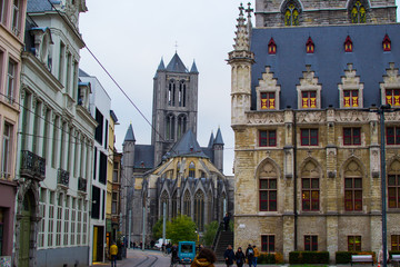 Obraz premium Saint Nicholas' Church (Sint-Niklaaskerk) with the Belfry (Het Belfort) at the foreground in Ghent, Belgium, Europe