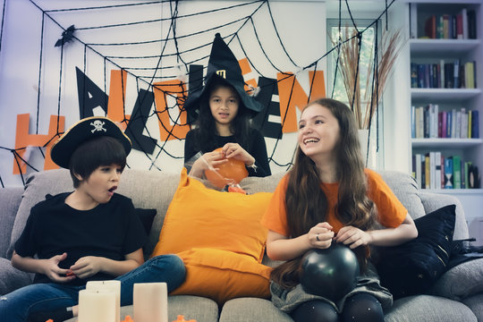 Halloween Party Kids Smiling Happy To Play And Prepare Decoration Toy Balloon For Halloween Day Coming Soon In Living Room At Home Together