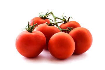 A bunch of fresh tomato isolated on white background