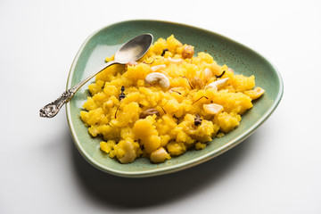 Pineapple sheera or Halwa also known as Ananas keshri shira. Popular South Indian Dessert recipe. selective focus