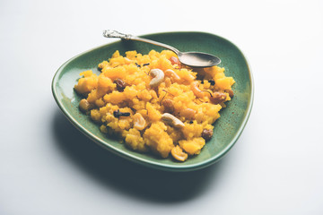 Pineapple sheera or Halwa also known as Ananas keshri shira. Popular South Indian Dessert recipe. selective focus