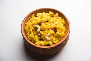 Pineapple sheera or Halwa also known as Ananas keshri shira. Popular South Indian Dessert recipe. selective focus