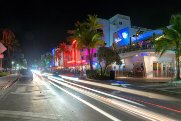 Night street at Ocean Drive in Miami Beach, Florida - hotels and restaurants at sunset on Ocean...