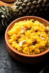 Pineapple sheera or Halwa also known as Ananas keshri shira. Popular South Indian Dessert recipe. selective focus