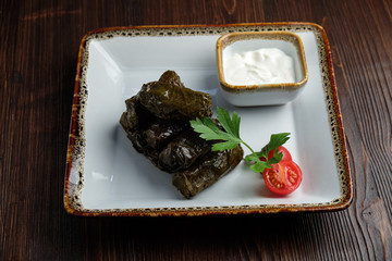 Dolma meat with sauce . menu for catering