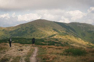 Obraz premium Hiking in the Low Tatra mountains in Slovakia, almost alone on the ridgeway, only majestic mountains