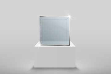 Glass showcase for the exhibition in the form of a cube. Background for sale illuminated by spotlights. Museum glass box isolated advertising or business design boutique. Exhibition hall