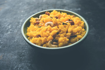 Pineapple sheera or Halwa also known as Ananas keshri shira. Popular South Indian Dessert recipe. selective focus