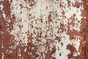 Rusty on red iron gates/plate that had been left to decay of a house in the city. abstract background texture