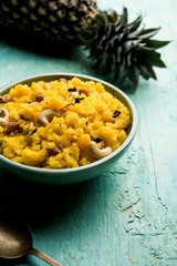 Pineapple sheera or Halwa also known as Ananas keshri shira. Popular South Indian Dessert recipe. selective focus