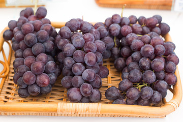 Fresh red grapes in a basket