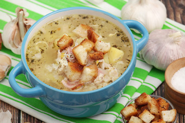 A bowl with traditional Czech garlic soup cesnecka