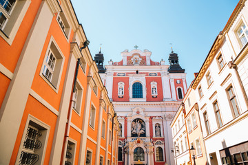 Saint Stanislaus Church (Fara Church) and old town street in Poznan, Poland