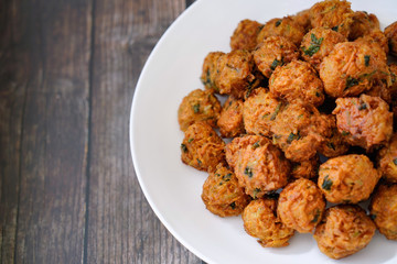 Chinese food croquettes，Wooden table top background