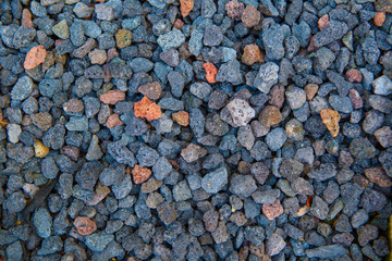 Old red brick wall. Old concrete wall. The facade of the house built of solid stone cement