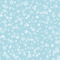 Fototapeta na wymiar Cozy festive falling snow seamless vector pattern. Scattered transparent dots and spots on pastel blue background. Perfect for packaging, Christmas and New Years projects, cards, greetings and