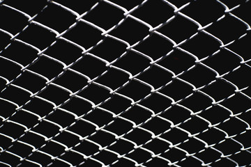 Mesh fencing with black background