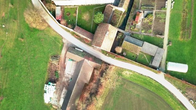 Top down aerial drone shot flying above and over Fahr Monastery in Unterengstringen, Switzerland