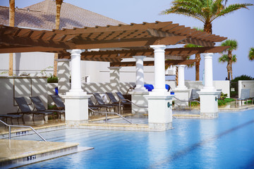 Swimming pool with lounge chairs