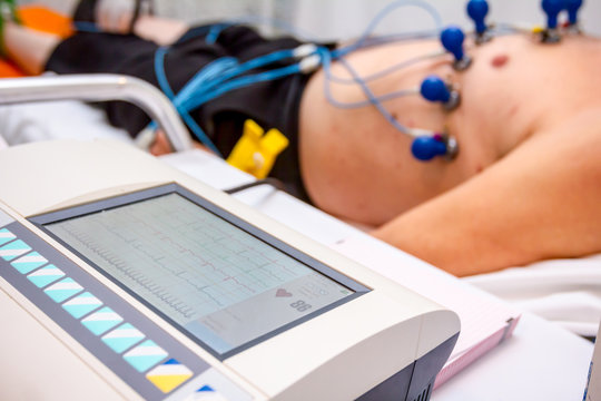 ECG Machine and Patient being tested - ECG Overview