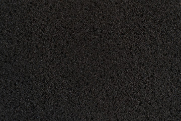 abstract dark black foam rubber texture, macro view, protection textured surface - obrazy, fototapety, plakaty