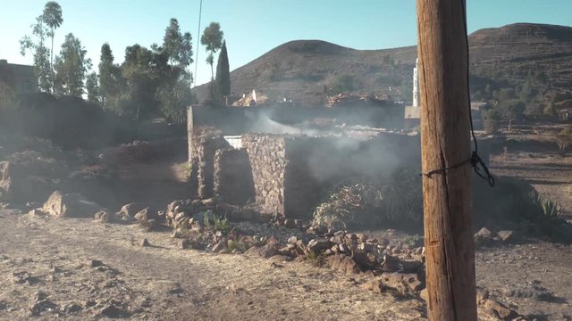 This no burning house, they simply just cooking food for the family using wood