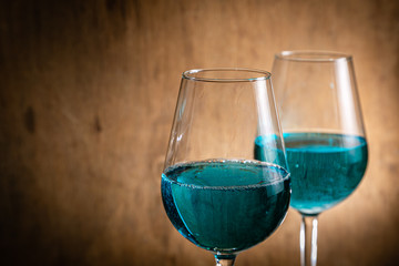 Food trend blue wine on rustic background, copy space
