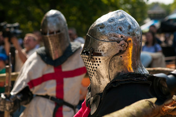 Medieval knight in the arena. Medieval knight prepare to battle at the festival of medieval culture.