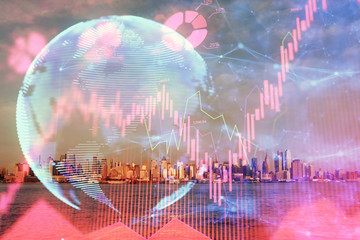 Double exposure of business theme hologram drawing and city veiw background. Concept of success.