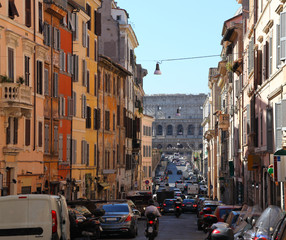 Rome, looking down the Via dei Serpenti towards the Colosseum on a summer's day.