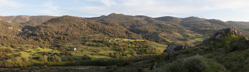 Fototapeta premium Cyprus rocky hills with agriculture, houses and small churches
