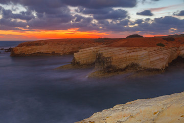 Fototapeta na wymiar Rocky seascape from the island of Cyprus with the shipwreck as main object