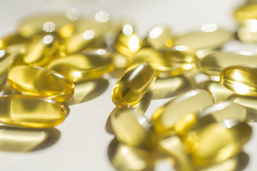 capsules of fish fat oil vitamin for heart, omega 3, macro