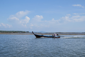  Long tail boat sailing at sea Southern Thailand
