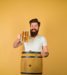 Beer in Germany. Brewery concept. Bearded man drinking ale. Oktoberfest festival. Craft beer at restaurant. Man tasting draft beer. Beer pub and bar. Bearded man hold glass with delicious ale. Brewer.