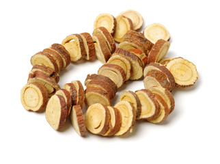 Licorice roots on white background