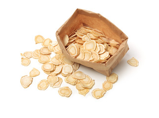 Chinese Herbal medicine - American Ginseng slices (Panax quinquefolius) isolated on white background