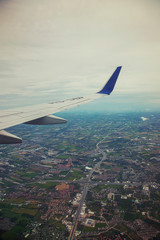 Airplane wing with city view