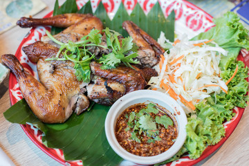 Grilled chicken in a color tray