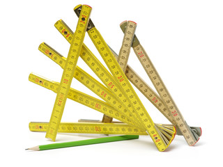 Wooden folding ruler on white background