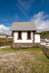 Small church with wooden roof in mountain, Passo Rolle, Fiera di Primiero, Dolomites, Italian Alps, Trentino Alto Adige, Italy, Europe